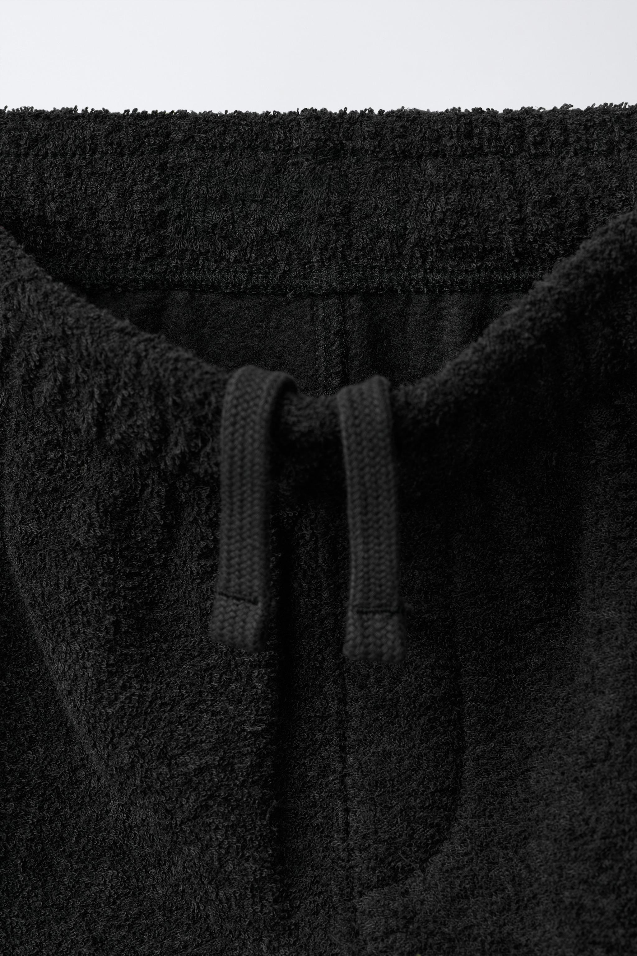 SWEATSHIRT AND WIDE LEG PANTS WITH TEXTURED LABEL SET